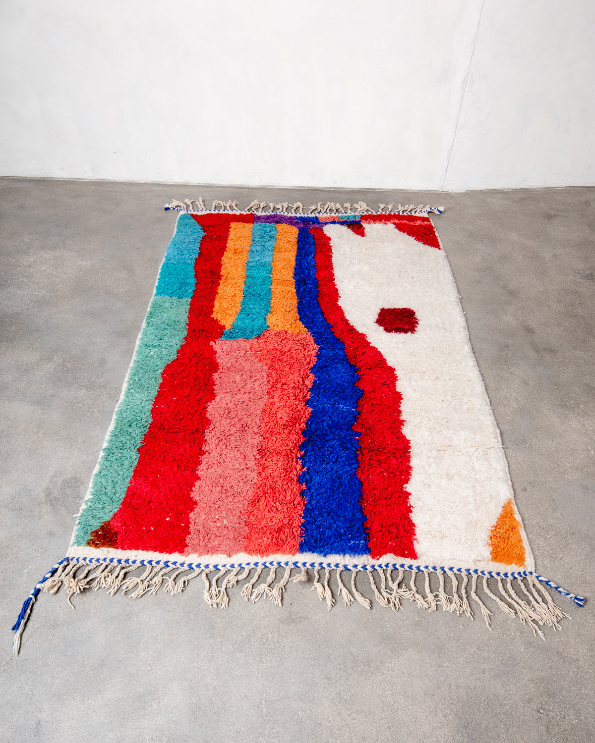 Modern, designer, handcrafted Berber runner rug from Morocco. Beniourain carpet with beautiful colours and patterns and fluffy wool texture.